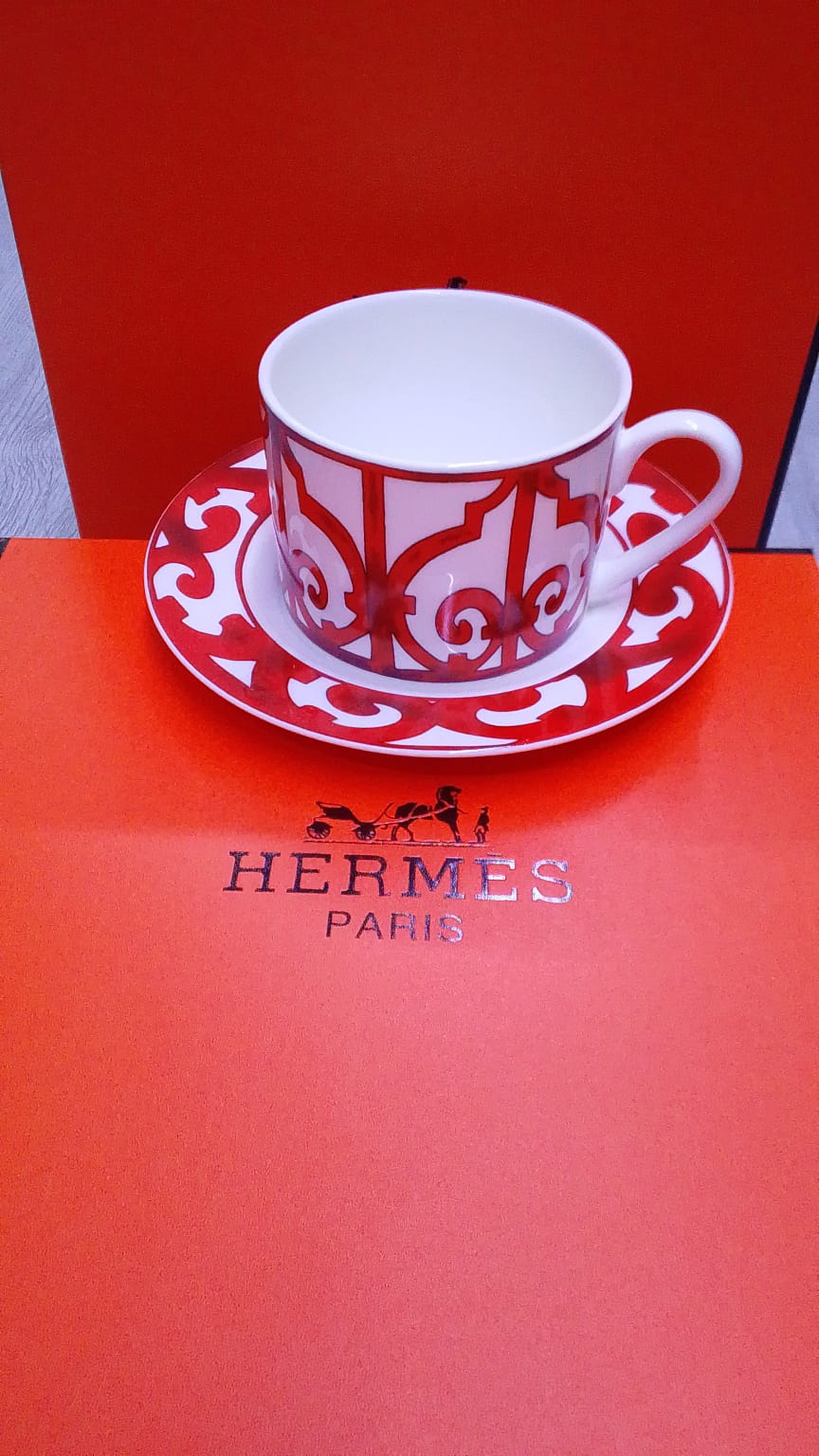 Hermès 'Passifolia' Porcelain Tea Cup and Saucer Set
