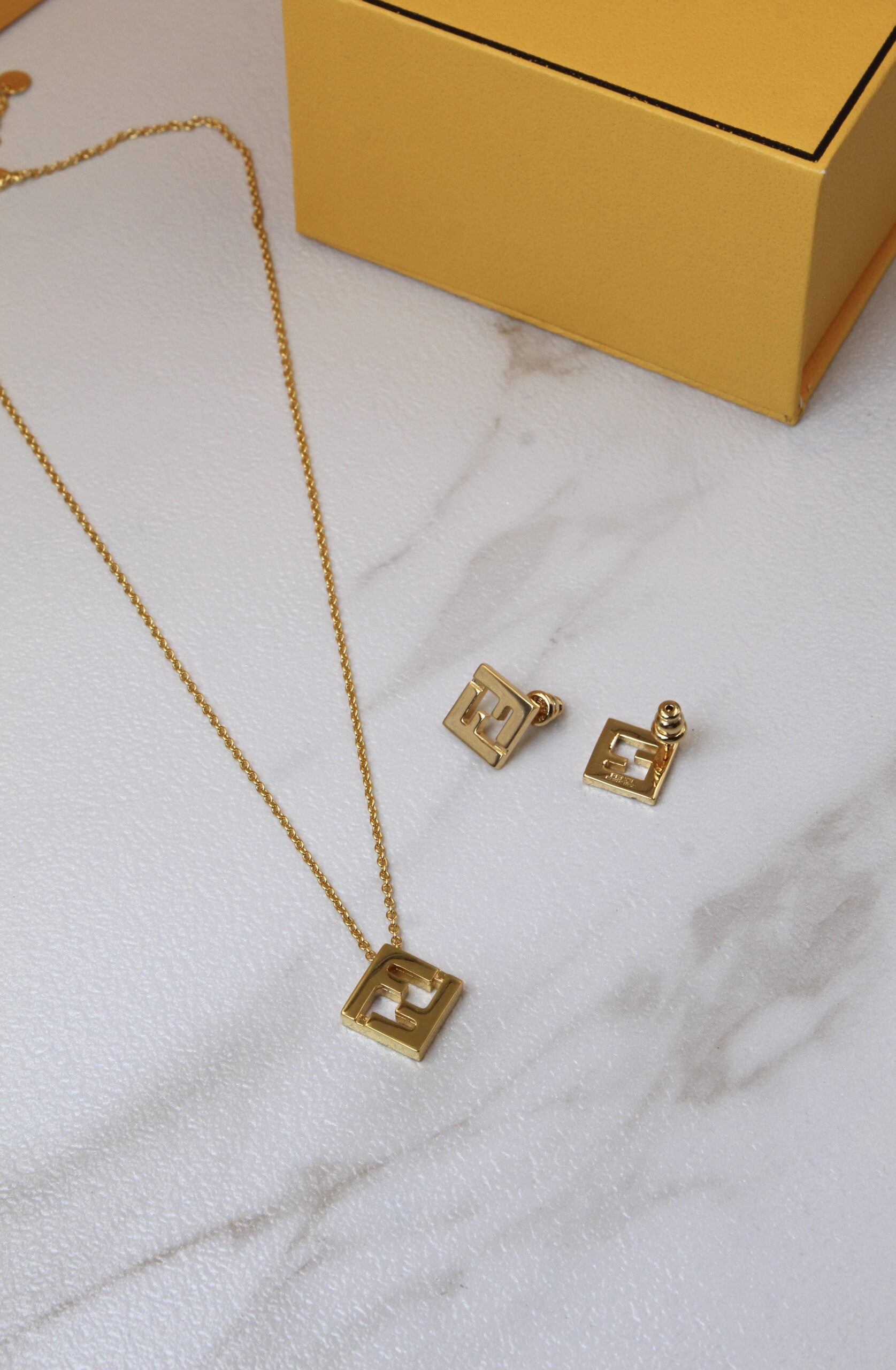 Fendi Gilt FF Logo Pendant Necklace and Earring Set