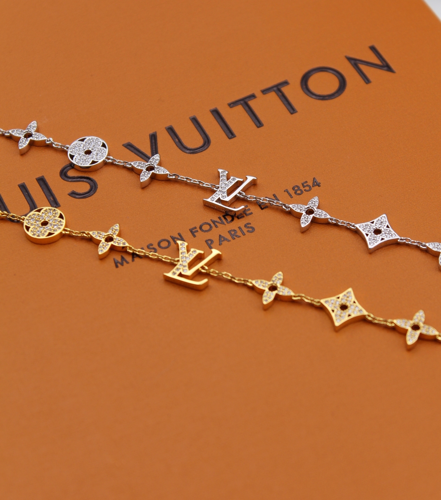 Louis Vuitton Blossom & LV Initials Pavé Diamond Link Bracelets in 18K Yellow and White Gold