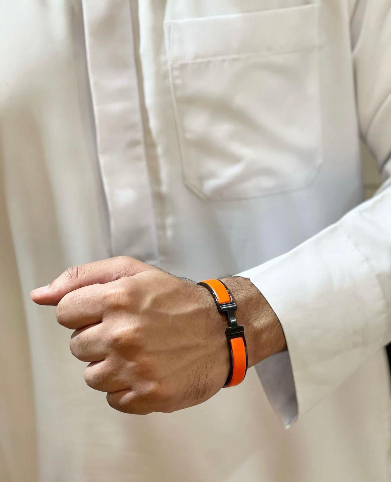 Hermes Noir and Orange Enamel Clasp Leather Bracelet