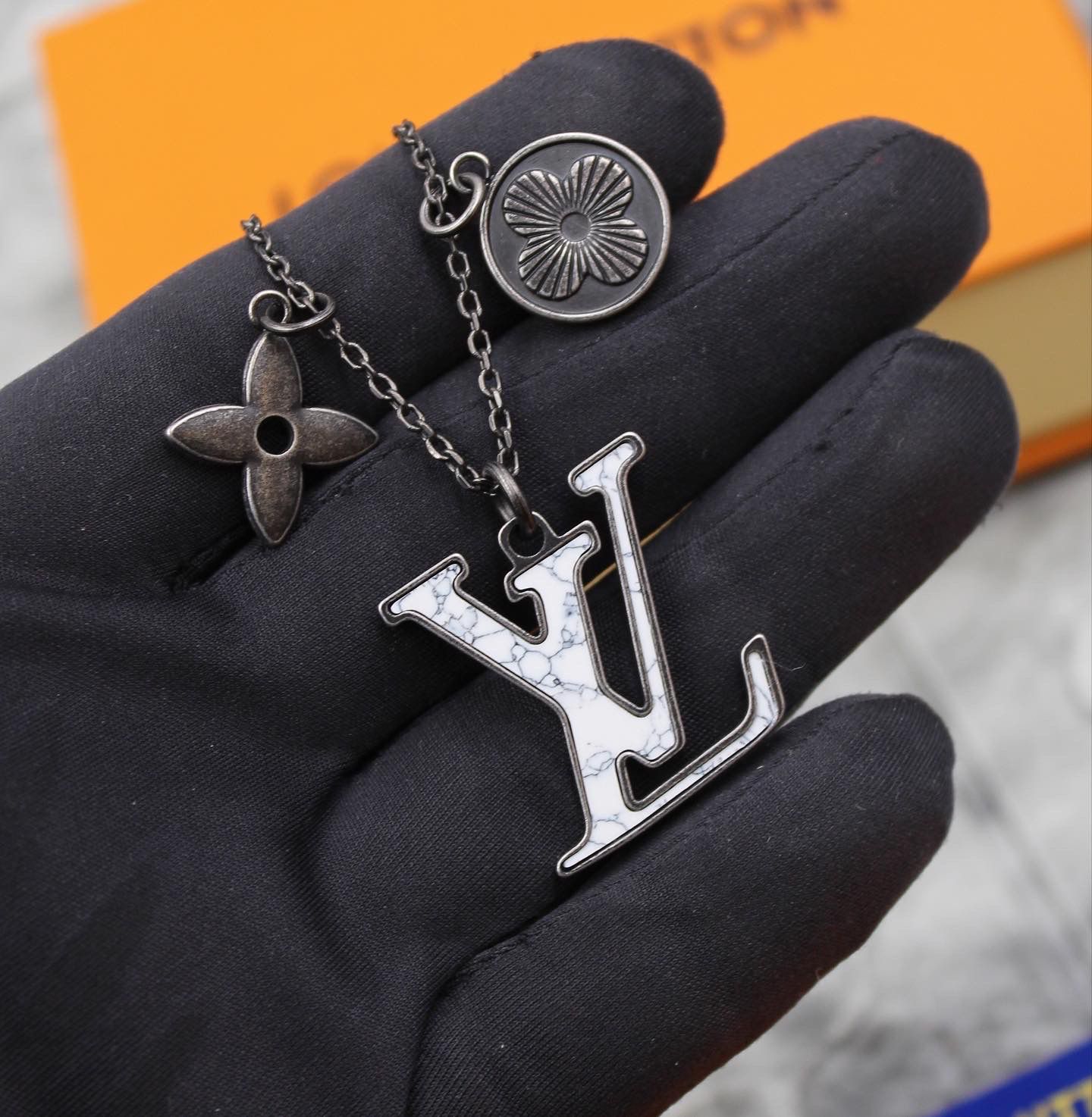 Louis Vuitton Monogram Marble LV Signature Pendant Necklace in Aged Ruthenium Finish