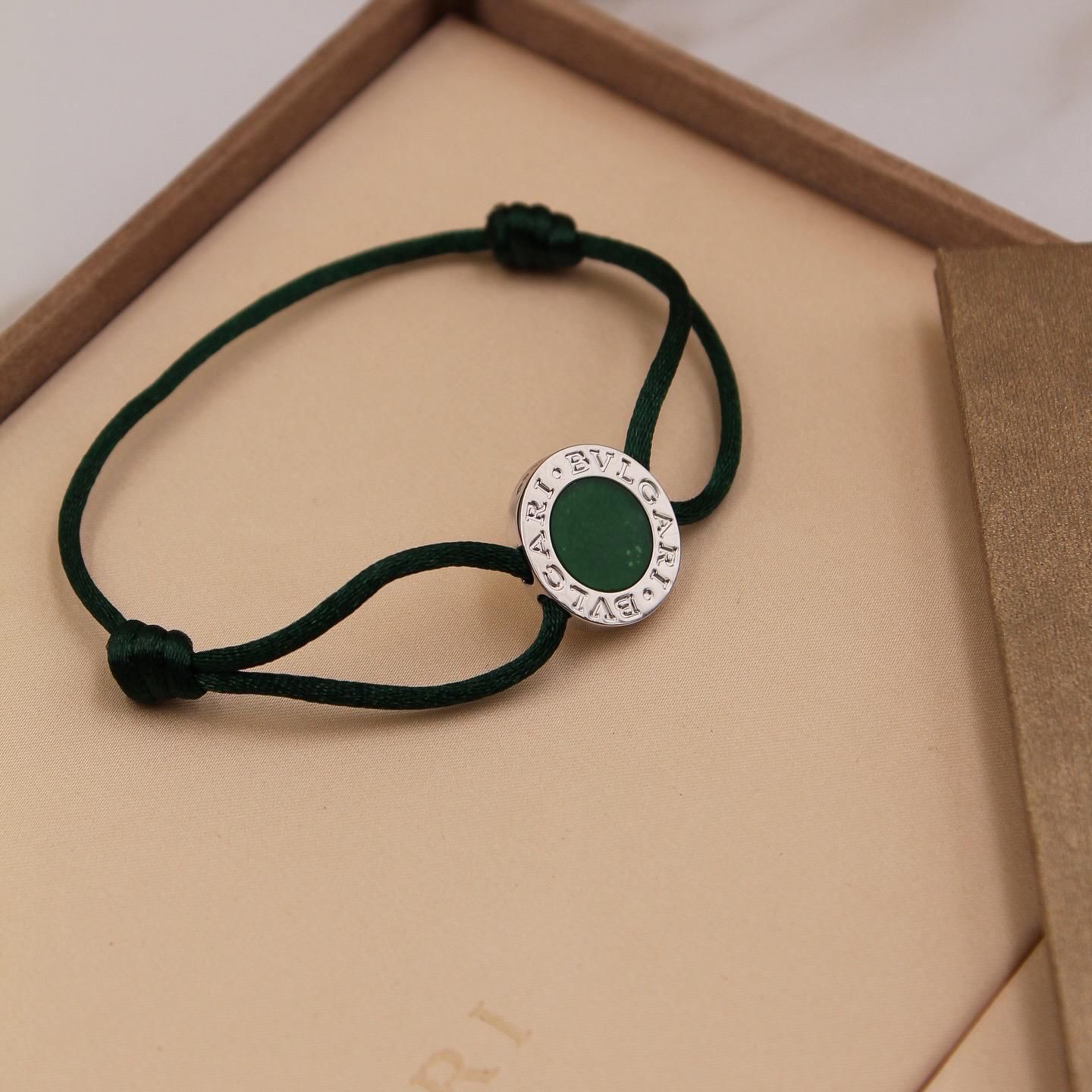 Bvlgari Emerald Green Cord and Silver Logo Bracelet