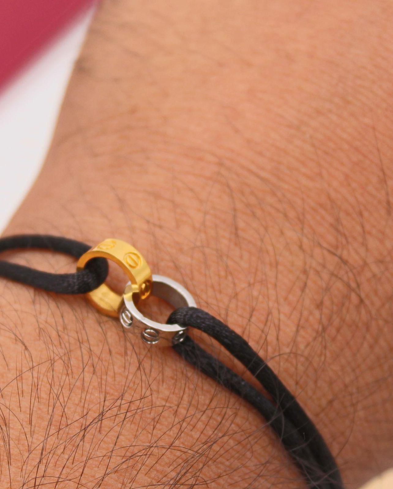 Dual-Tone Interlocking Screw-Motif Cord Bracelet in Yellow and White Precious Metal